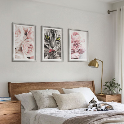 Cadre photo mural Chat dans des fleurs roses