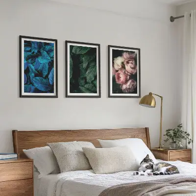 Cadre photo mural avec motif de feuilles et de fleurs en divers coloris
