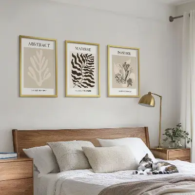 Cadre photo mural avec motifs végétaux dans les tons beige et brun