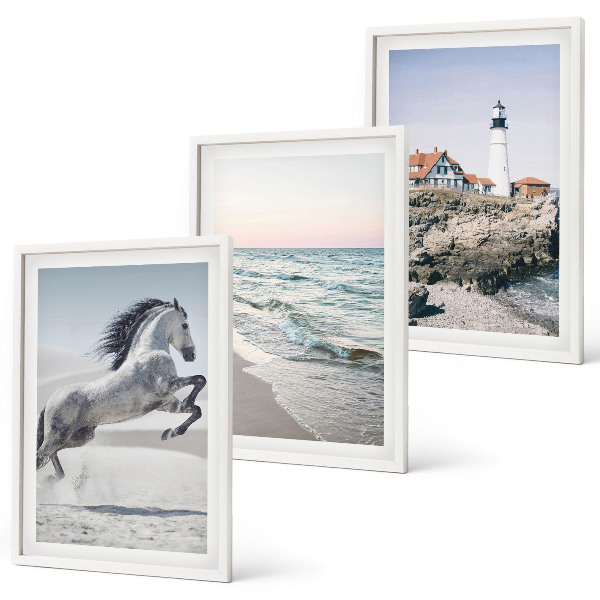 Cadre photo mural Chevaux plage phare vagues