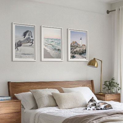 Cadre photo mural Chevaux plage phare vagues