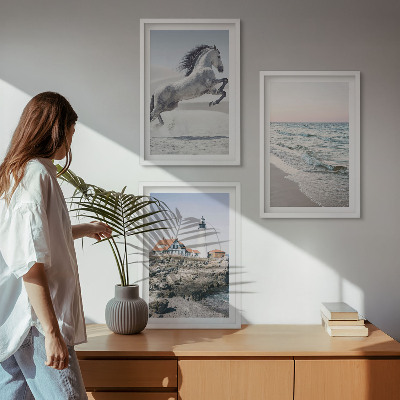 Cadre photo mural Chevaux plage phare vagues