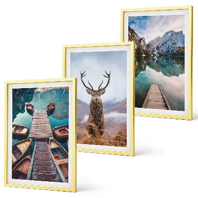 Cadre photo mural motif lac, bateaux et montagnes avec cerfs