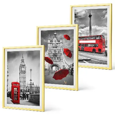 Cadre photo mural représentant une cabine téléphonique avec un parapluie rouge et un bus londonien
