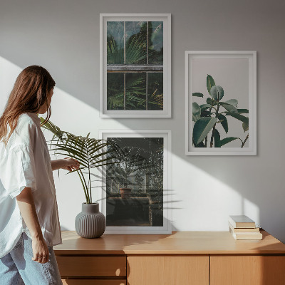 Cadre photo mural Feuilles vertes sur la plante de fenêtre