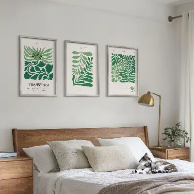 Cadre photo mural avec motif de feuilles vertes