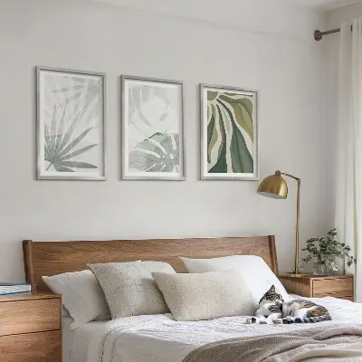 Cadre photo mural avec motif de feuilles de plantes vertes et grises