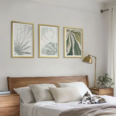 Cadre photo mural avec motif de feuilles de plantes vertes et grises