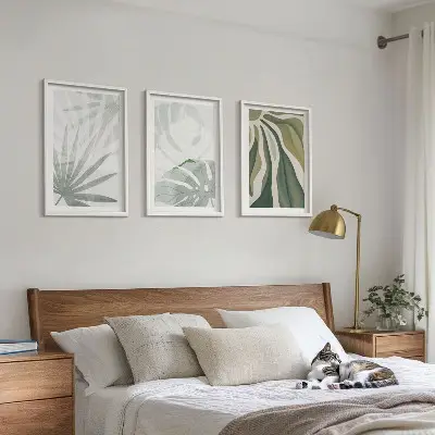 Cadre photo mural avec motif de feuilles de plantes vertes et grises