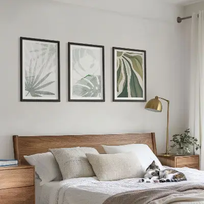 Cadre photo mural avec motif de feuilles de plantes vertes et grises