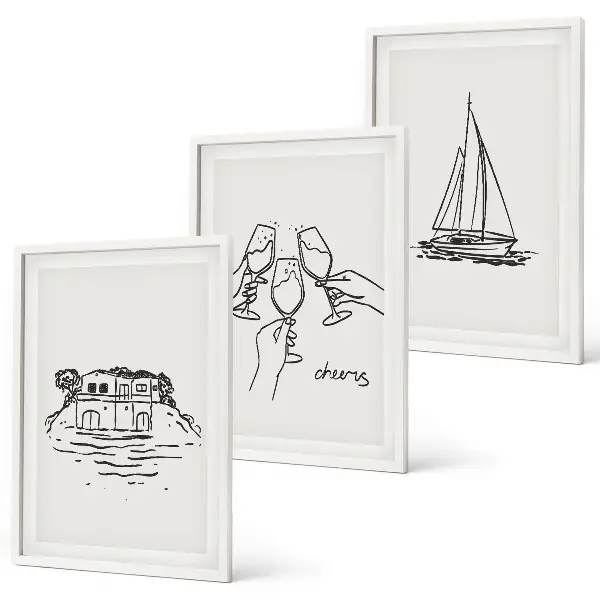 Lot de 3 tableaux pour salon motif de voilier dans une maison au bord de l'eau