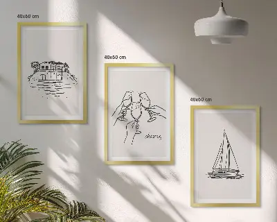 Lot de 3 tableaux pour salon motif de voilier dans une maison au bord de l'eau