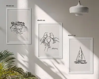 Lot de 3 tableaux pour salon motif de voilier dans une maison au bord de l'eau