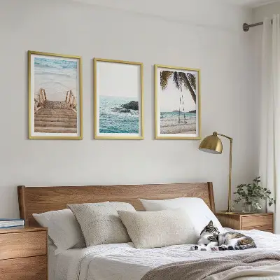 Cadre photo mural représentant des escaliers, une plage et une balançoire de mer