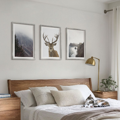 Cadre photo mural Paysage de montagne avec des cerfs