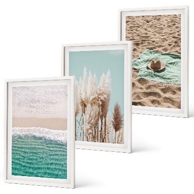 Cadre photo mural Chapeau en herbe sur les vagues de la plage