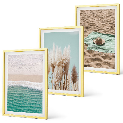 Cadre photo mural Chapeau en herbe sur les vagues de la plage