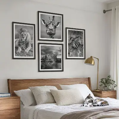 Ensemble de 4 tableaux représentant des animaux sauvages comme le lion, le jaguar, la girafe et les zèbres