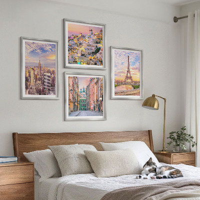 Mur de tableaux New york paris oia varsovie crépuscule