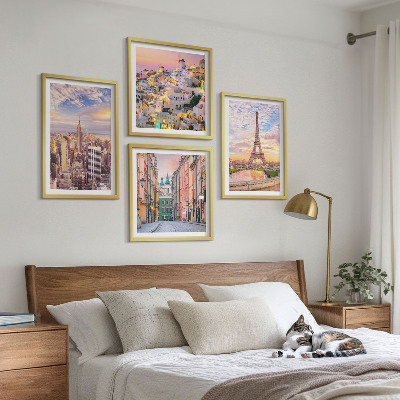 Mur de tableaux New york paris oia varsovie crépuscule