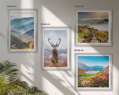 Ensemble de 4 tableaux représentant un paysage de lac avec montagnes et cerf