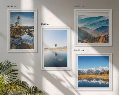 Mur de tableaux vues sur la nature avec phare et montagnes