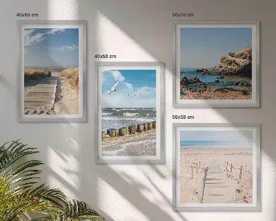 Mur de tableaux plage avec sable, vagues, ciel et oiseaux
