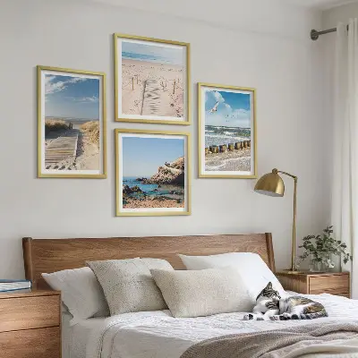 Mur de tableaux plage avec sable, vagues, ciel et oiseaux