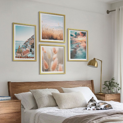 Mur de tableaux Coucher de soleil sur la mer, maisons et fleurs