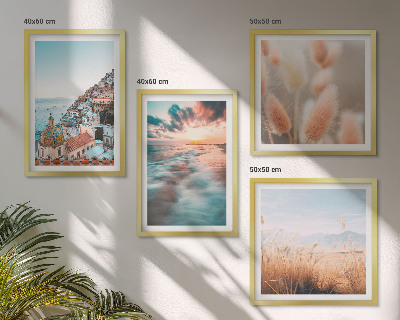 Mur de tableaux Coucher de soleil sur la mer, maisons et fleurs