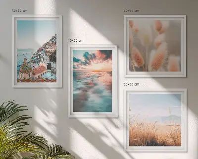 Mur de tableaux coucher de soleil sur la mer avec maisons et fleurs