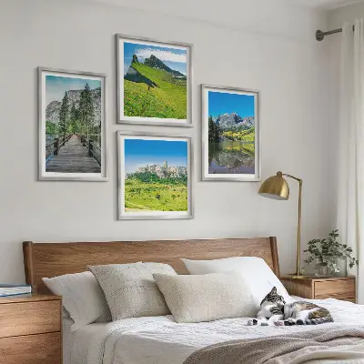 Ensemble de 4 tableaux représentant des collines verdoyantes avec un château