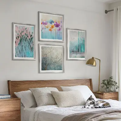 Ensemble de 4 tableaux motifs de fleurs aux tons pastel