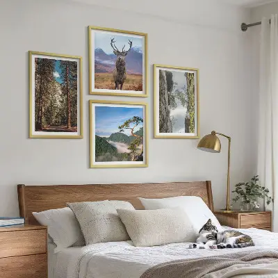 Ensemble de 4 tableaux représentant une nature sauvage avec forêt, montagnes et cerf