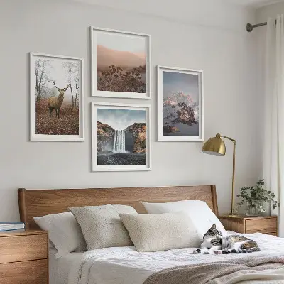 Ensemble de 4 tableaux représentant des paysages sauvages avec des montagnes et des cerfs