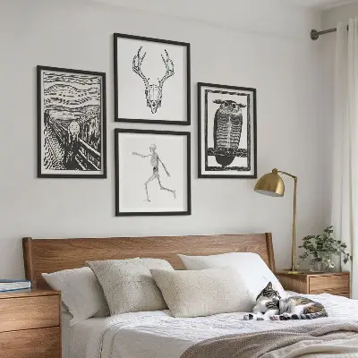 Mur de tableaux inspiration crâne de hibou