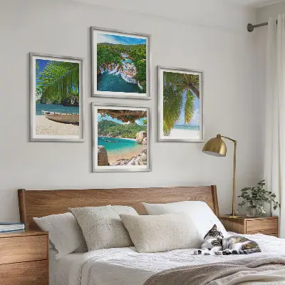 Mur de tableaux plage, bateau, cascades et palmiers