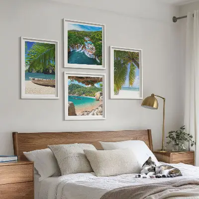 Mur de tableaux plage, bateau, cascades et palmiers