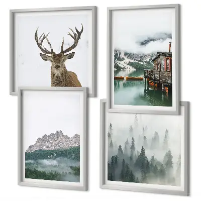 Mur de tableaux représentant des montagnes, un lac, un cerf, une cabane et du brouillard