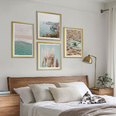 Mur de tableaux Chapeau en herbe sur les vagues de la plage