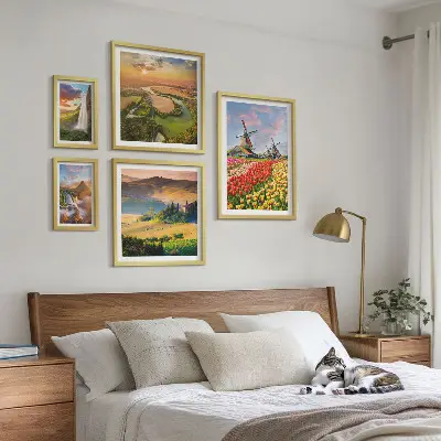 Lot de tableaux encadrés représentant des paysages naturels, des cascades et des moulins à vent