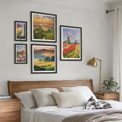 Lot de tableaux encadrés représentant des paysages naturels, des cascades et des moulins à vent
