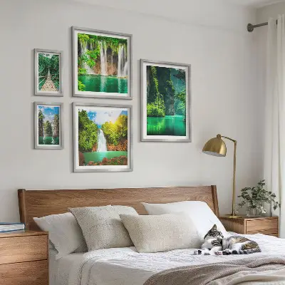 Lot de tableaux encadrés représentant des cascades tropicales et une nature verdoyante