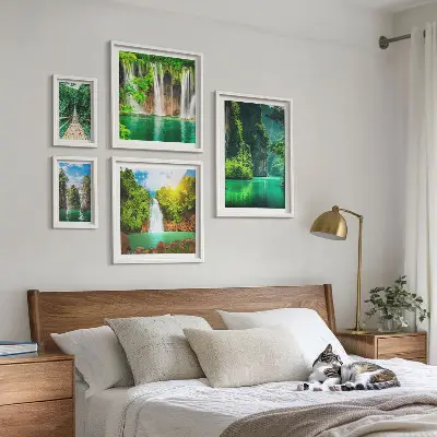 Lot de tableaux encadrés représentant des cascades tropicales et une nature verdoyante