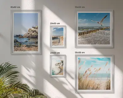 Lot de tableaux encadrés représentant des paysages de plage en bord de mer