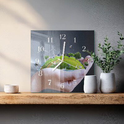 Horloge carrée en verre La terre dans la main