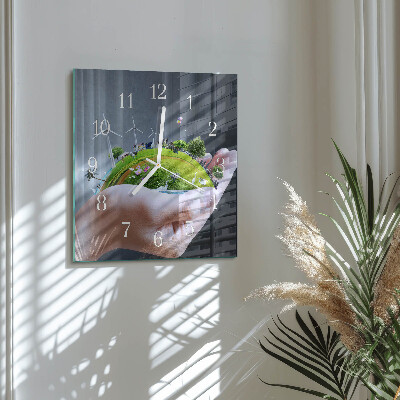 Horloge carrée en verre La terre dans la main