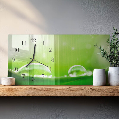 Horloge horizontale en verre Des gouttes sur une feuille