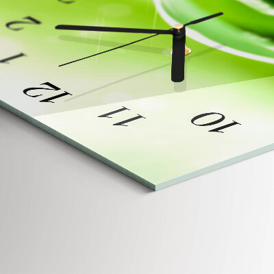 Horloge horizontale en verre Des gouttes sur une feuille