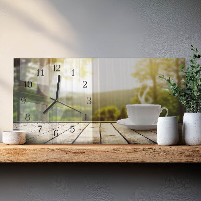 Horloge horizontale en verre Une tasse de café